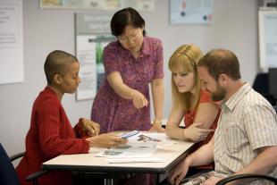 Men and women working together on a project